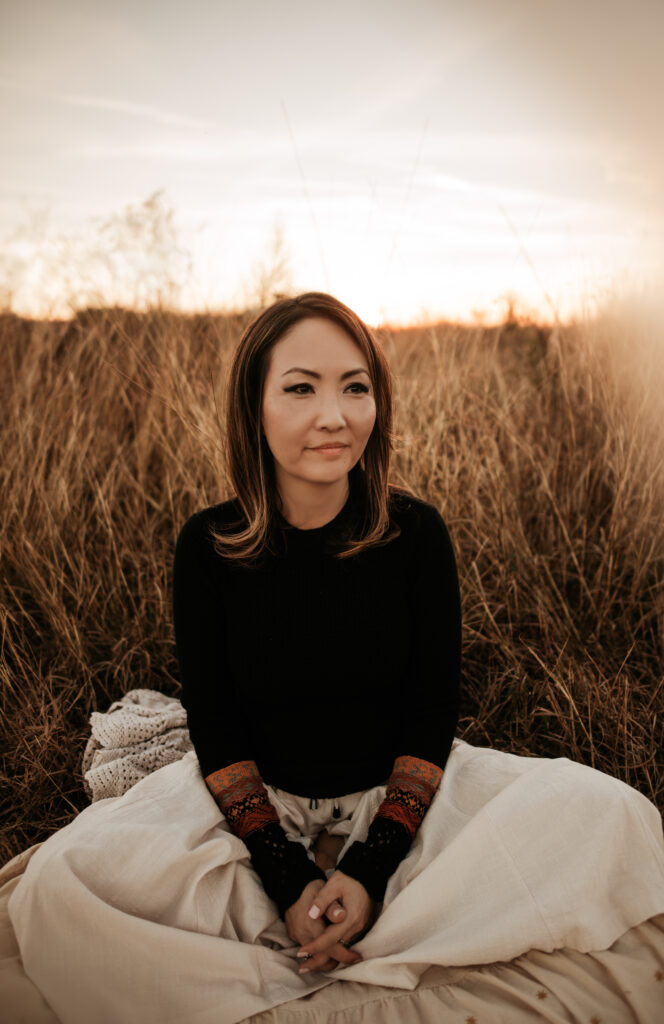 Jackie Jin, an akashic records practitioner based in Cypress, TX offering remote energy healing sessions and akashic records readings
